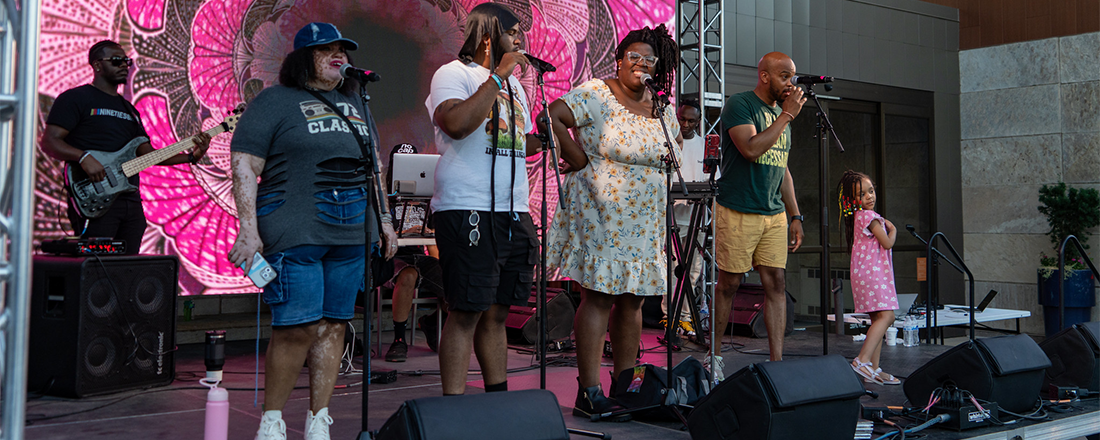 group of performers on stage