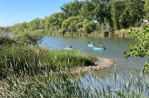 Kayakers on Pond at Arapaho Bend Natural Area