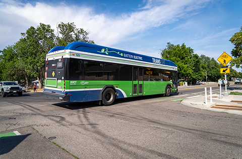 City of Fort Collins Transfort bus driving down the road.