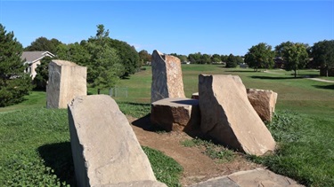 Stone sculptures at the top of a hill