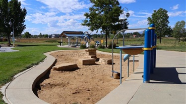A sandbox at a park playground