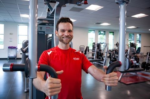Portrait photo of Brian Nichols in a weight room