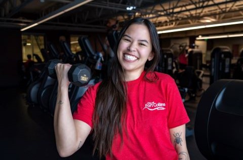 Portrait photo of Samantha Tovey in a weight room