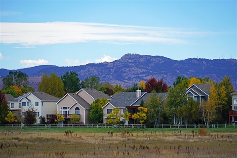 single-family houses with fall trees